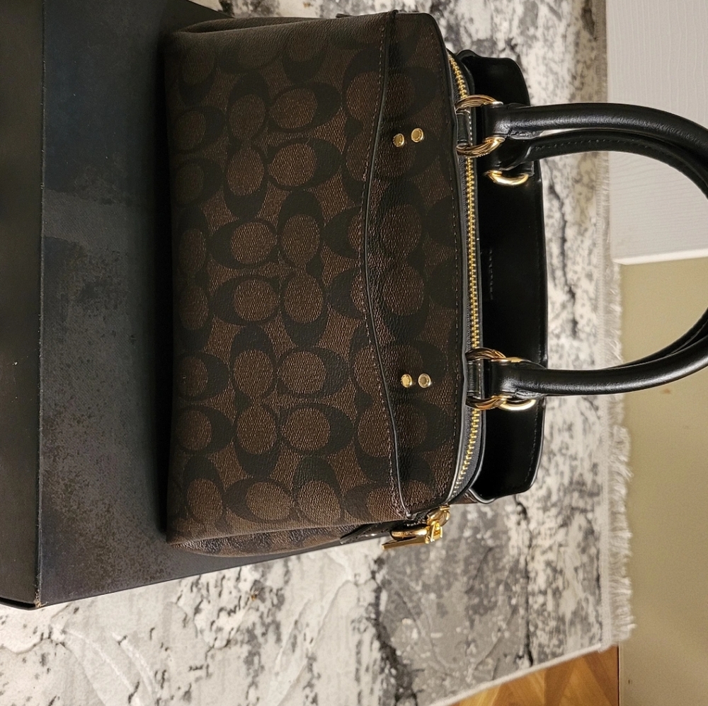 Coach brown bag leave a comment for private pricing with your email.